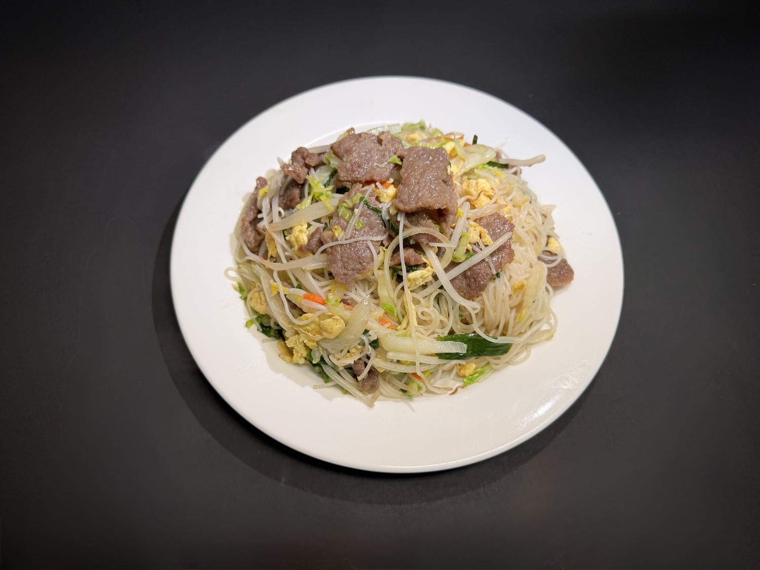 Beef rice noodles stir‑fried with egg, cabbage and fresh vegetables at Lucky House, a Chinese restaurant in Surprise Beef rice noodles stir‑fried with egg, cabbage and fresh vegetables at Lucky House, a Chinese restaurant in Surprise