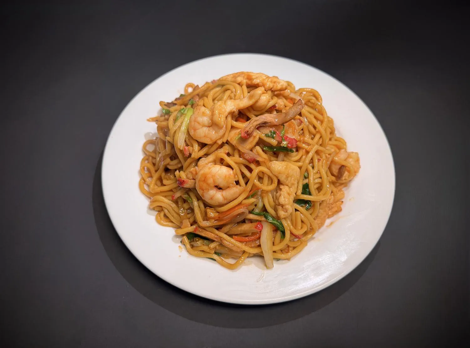 Seafood lo mein noodles with shrimp, chicken strips and mixed fresh vegetables at Lucky House, a Chinese restaurant in Surprise Seafood lo mein noodles with shrimp, chicken strips and mixed fresh vegetables at Lucky House, a Chinese restaurant in Surprise